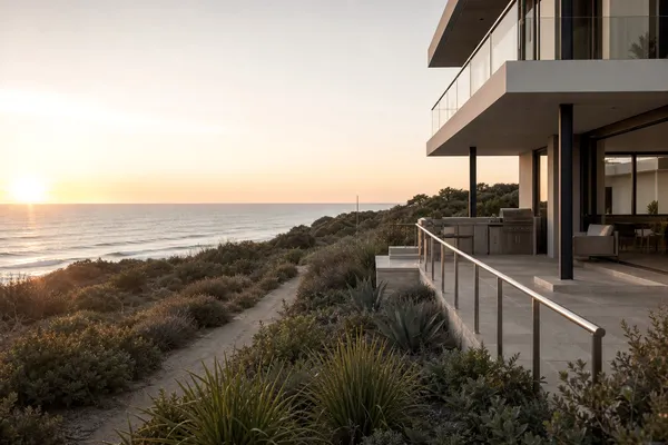 Modern home with ocean-view deck and stainless balustrade above the Burns Beach coastal path